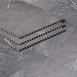 Artmore Tile Rogue Marble Dark Gray 12-in X 24-in Waterproof Interlocking Luxury Flooring (28.04-sq Ft)